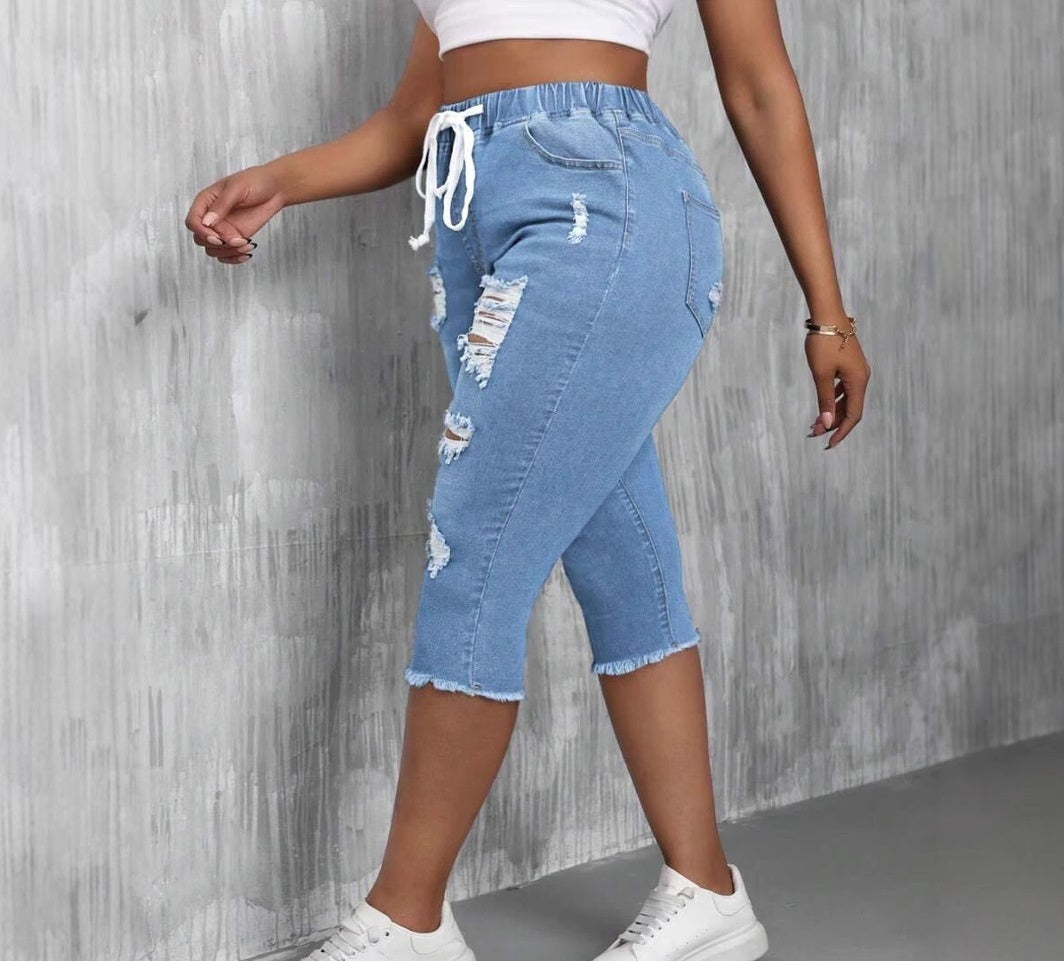بنطلون جينز نسائي ممزق بمقاسات كبيرة لتنحيف الجسم